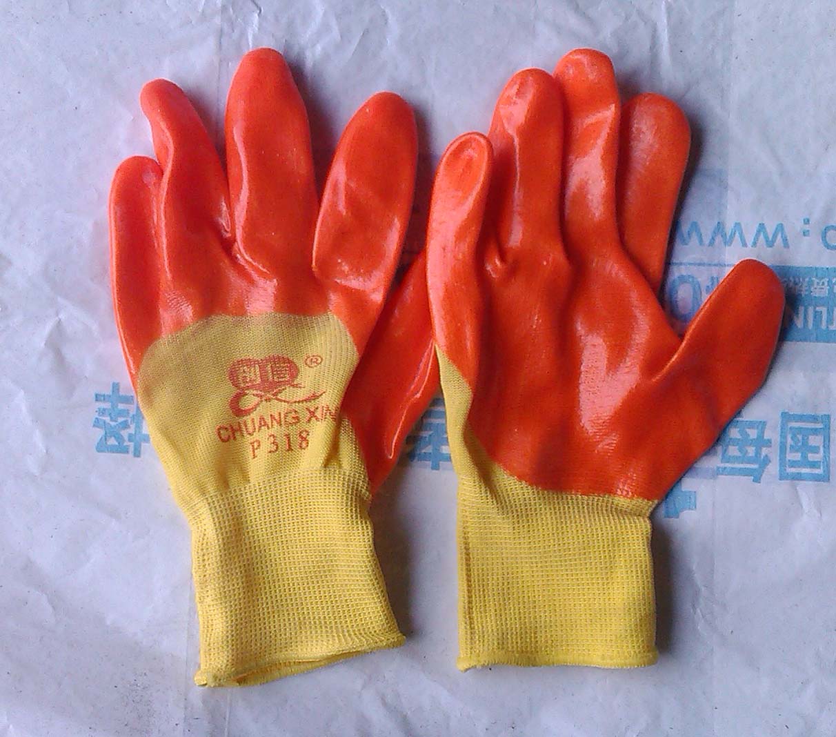 創(chuàng)信彩紗PVC半浸手套 保護雙手的時尚之選